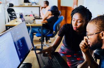 two people using computer