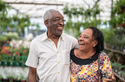 a couple at a greenhouse