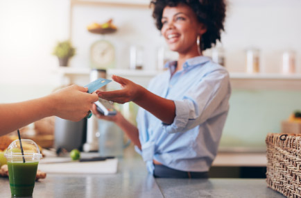 person paying at store