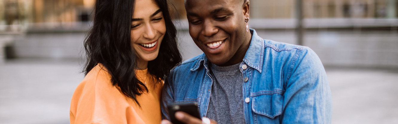 Couple looking at phone